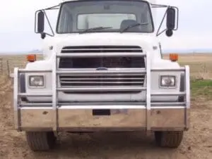 Front view of white truck with chrome bumper